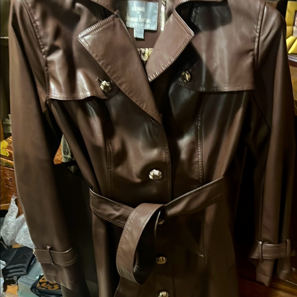 Chic Brown Leather Trench Coat by Dennis basso
Ankle length with belt